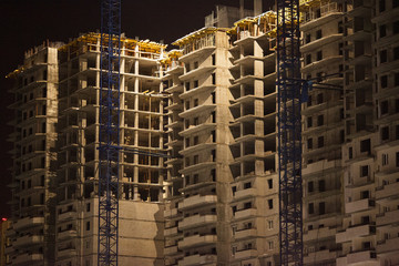 Urban construction of residential buildings in the night metropolis