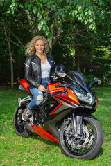 Obraz na płótnie Canvas Happy sport motocyclist