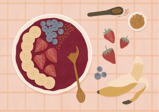 Smoothie bowl food flatlay on checkered tablecloth