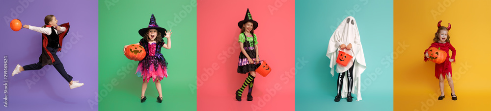 Canvas Prints Children in carnival costumes on multicolor background.