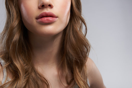 Teen girl demonstrating her beautiful full lips