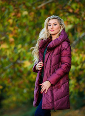 Girl fashionable blonde walk autumn park. Jackets everyone should have. Best puffer coat to buy....