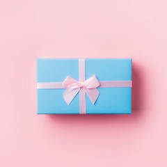 Blue gift box on pink.