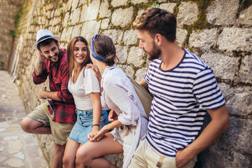 Happy group of tourists traveling and sightseeing