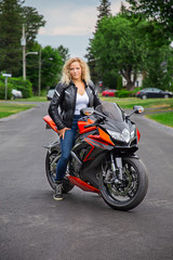 Fototapeta na wymiar sexy woman on motocycle