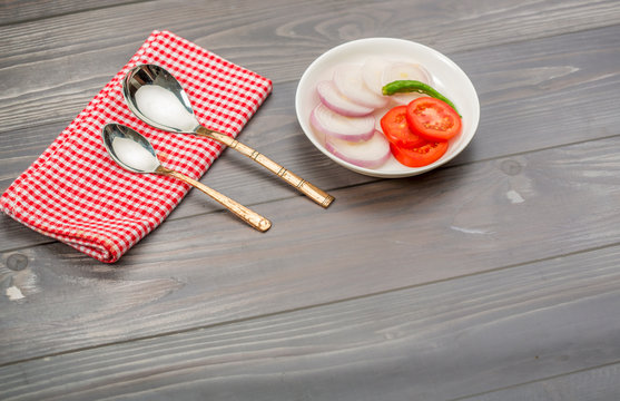 table cutery and salad on dining table