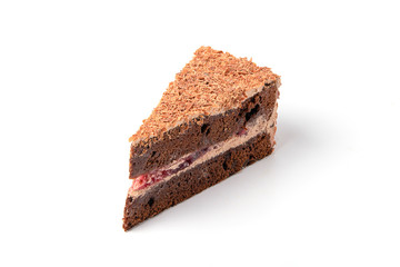 Piece of chocolate flakes cake isolated on white background