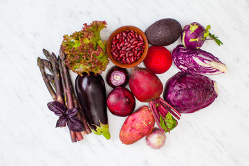 Variety of fresh vegetables on a white background