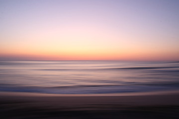 Fototapeta na wymiar Sunrise long exposure panorama at the beach