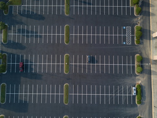 Looking down on a large, mostly empty parking lot. © Restless Mind Media 