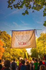 Banner Demanding Climate Action Now at March for Climate in Glasgow Scotland With Protesters and...