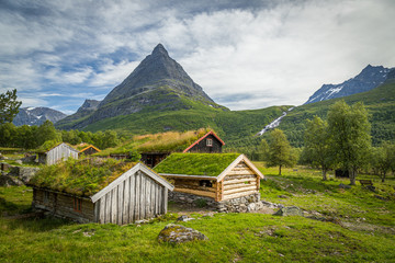 Mountain old farm called Renndolsetra with grassy roofs old barns. Trollheimen National Park.