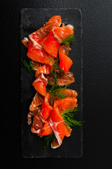 Smoked Salmon with spices and Dill, top view