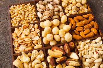 Close up variety of nuts in wooden box