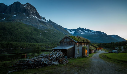 Fototapeta na wymiar Innerdalshytta tourist shelter after dusk. Trollheimen National Park in Norway.