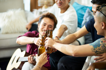 young asian adults partying at home