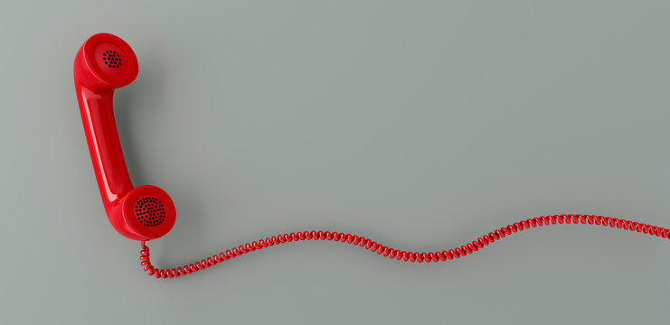 Red retro telephone receiver flying in front of a gray backdrop with copy space - 3d illustration
