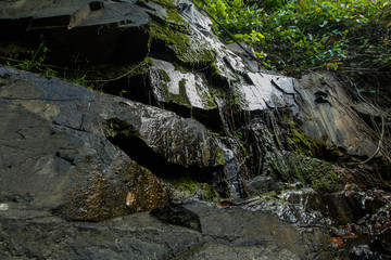 Ton Aow Yon Waterfall rich natural resources,in the forest,asia tropical areaat Island Phuket Thailand.