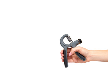 Hand with expander, sport equipment. Isolated background