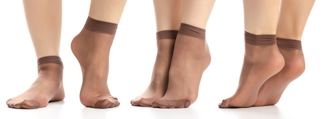 Set female legs in nylon socks on white background isolation
