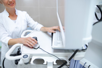 Therapist working with special computer in office stock photo