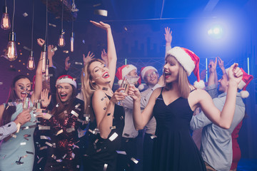 Portrait of nice attractive stylish cheerful cheery positive glad dreamy ladies and guy having fun...
