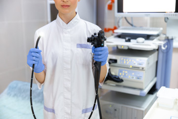 Female physician with endoscopy equipment stock photo