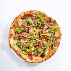 Tasty parma ham and artichoke pizza top view