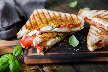 Sandwiches with mozzarella, basil and tomatoes. Italian sandwich