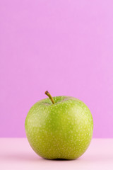 Creative layout made of green apples. Flat lay. Food concept.