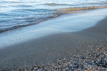 Wave of the sea or ocean in the calm on the sandy coast