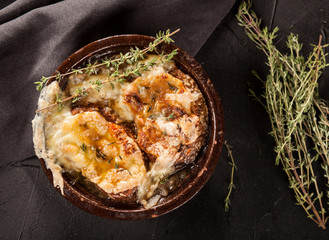 Onion soup with dried bread and cheese