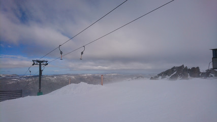 Fototapeta na wymiar Beautiful day in the snow, on the mountains, blue skies