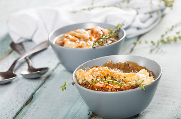 Onion soup with dried bread and cheese