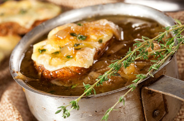 Onion soup with dried bread and cheese