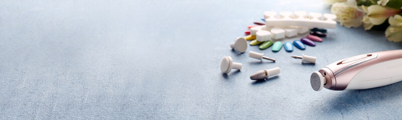 Pedicure milling cutter on color background with space for text