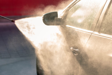 Washing a car in a car wash