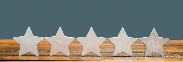 Five stars. The concept of the rating of hotels and restaurants. The evaluation of visitors. Quality level, good service. Best customer rating. Feedback. Satisfaction