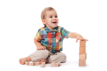 Happy Baby Boy Playing with Toys, Isolated on White Background