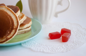 marmalade lying next to the pancakes