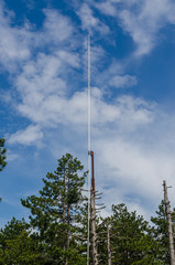 Blue sky and lightning rod