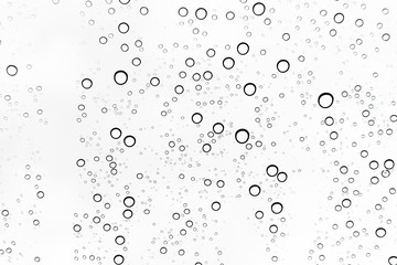 Rain drops on window glasses surface Natural Pattern of raindrops. Natural pattern of raindrops on white background for your design.