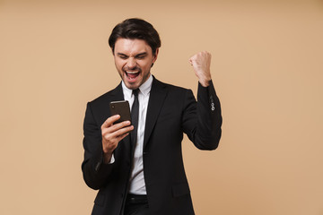 Portrait of a handsome young businessman wearing suit
