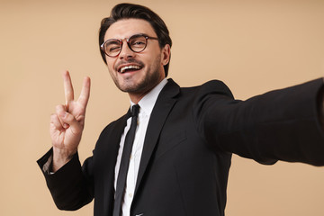 Portrait of a handsome young businessman wearing suit