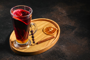 mulled wine, festive drink on the base wine and spices (festive treat, Christmas or New Year, winter) menu concept. food background. copy space. Top view