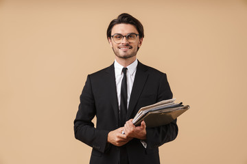 Portrait of a handsome young businessman wearing suit