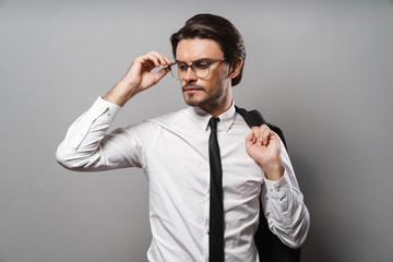 Portrait of a handsome young businessman wearing suit
