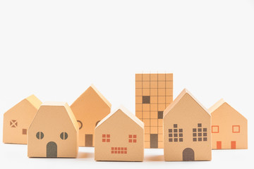 Paper house toy on white background with copy space.Real estate concept, New house concept, Finance loan business concept.