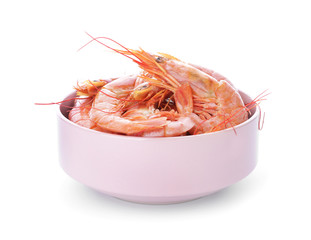 Bowl with tasty shrimps on white background