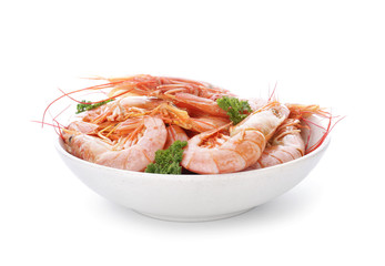 Bowl with tasty shrimps on white background